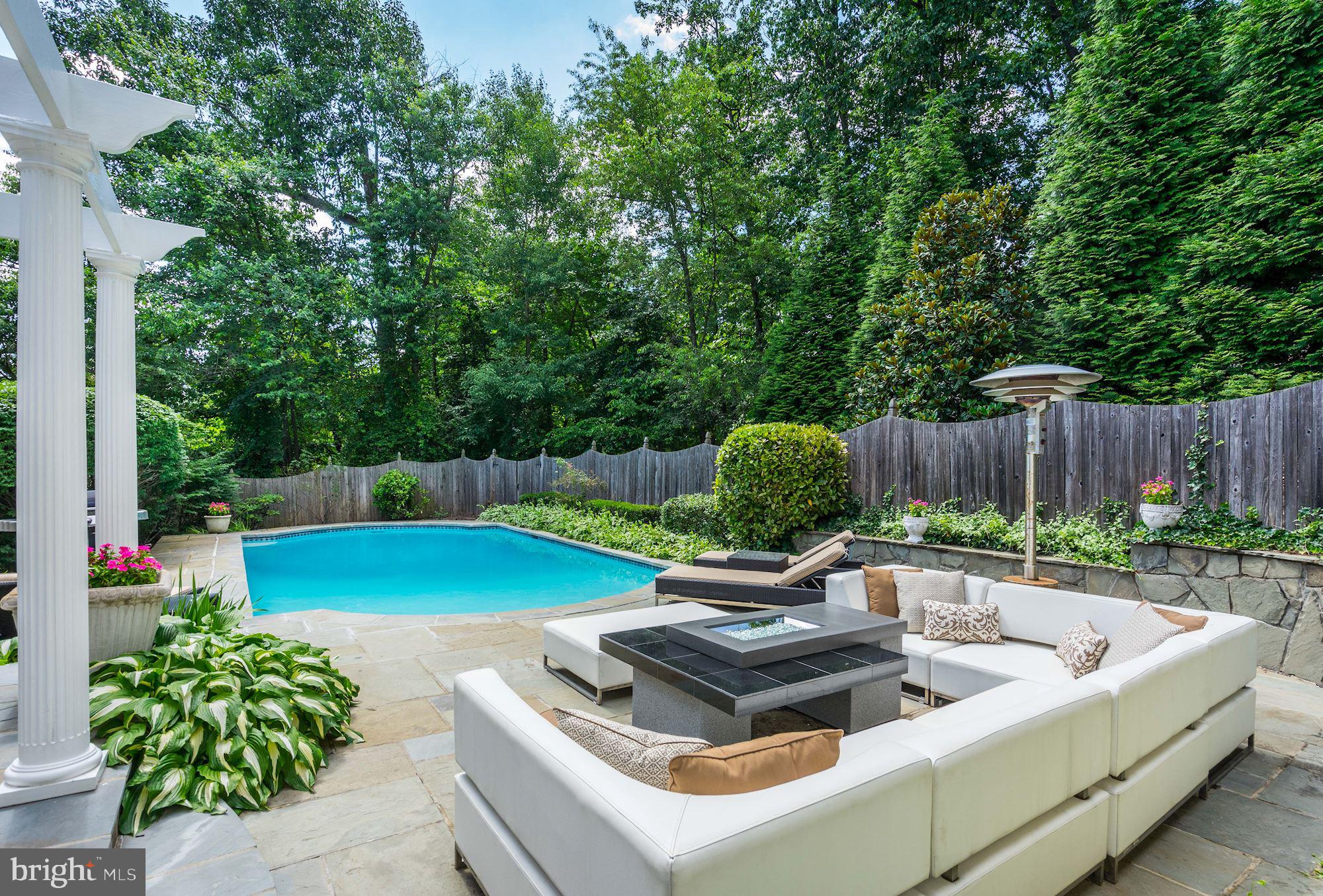8816 Brook Road McLean, VA 22102 - Photo 38 of 49 Slate patio & fire pit enhance outdoor setting