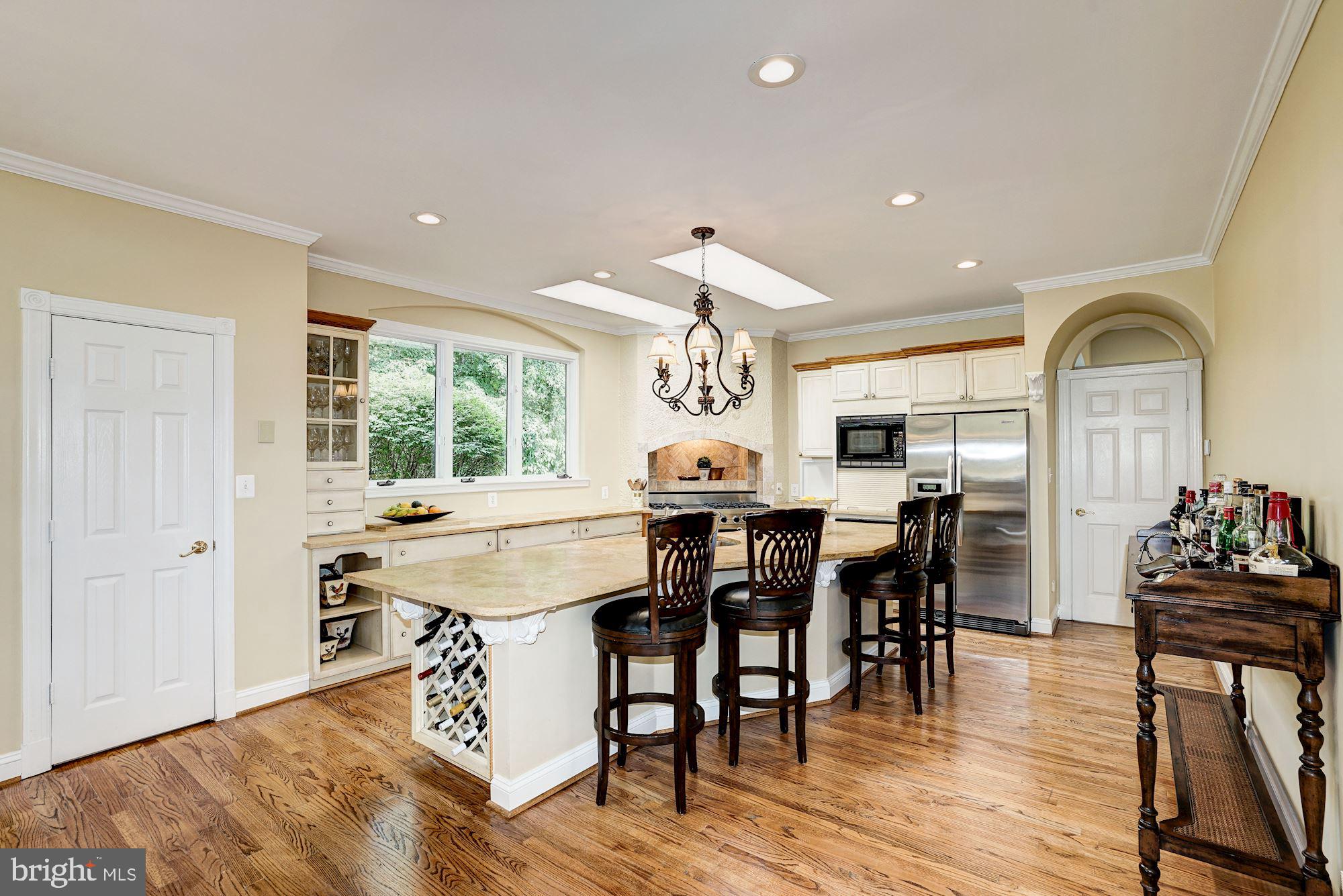 8816 Brook Road McLean, VA 22102 - Photo 6 of 49 Chef's kitchen opens to family room
