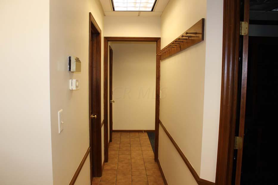 1900 Bethel Road Columbus, OH 43235 - Photo 9 of 24 Ceramic tile flooring. Ivory painted walls. Suspended ceiling. Fluorescent lighting. Chair railing.