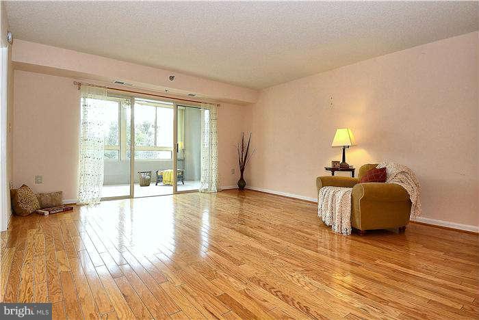 14801 Pennfield Circle, Unit 407 Silver Spring, MD 20906 - Photo 2 of 29 Sun drenched living room