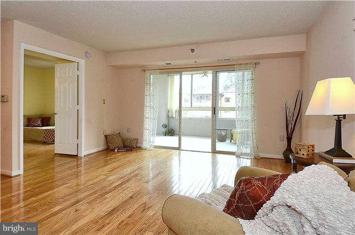 14801 Pennfield Circle, Unit 407 Silver Spring, MD 20906 - Photo 14 of 29 Slider to sun room
