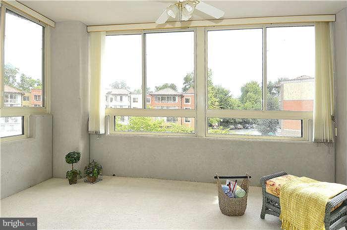 14801 Pennfield Circle, Unit 407 Silver Spring, MD 20906 - Photo 4 of 29 Spacious sun room