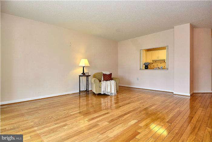 14801 Pennfield Circle, Unit 407 Silver Spring, MD 20906 - Photo 10 of 29 Gleaming hardwood floors