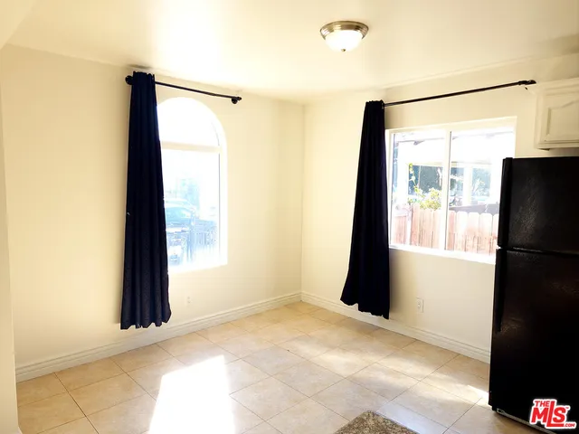 a bathroom with a toilet bathtub and shower