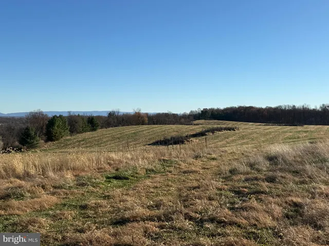 a view of lake and mountain
