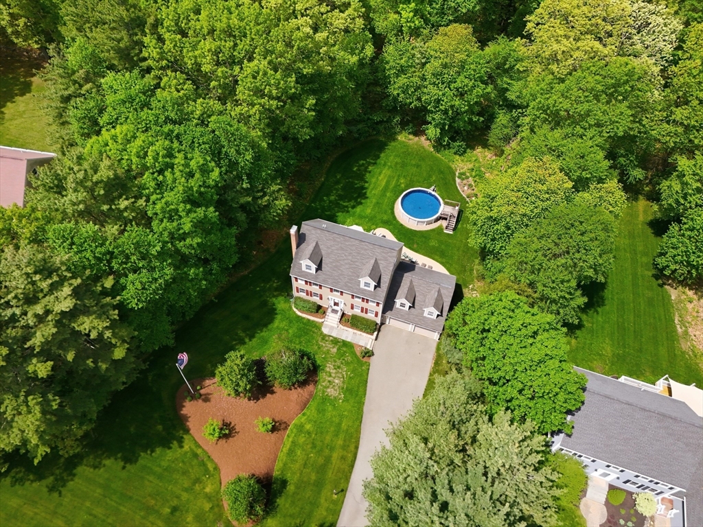 9 Fazio Farm Road Georgetown, MA 01833 - Photo 40 of 42 an aerial view of a house with a yard and outdoor seating