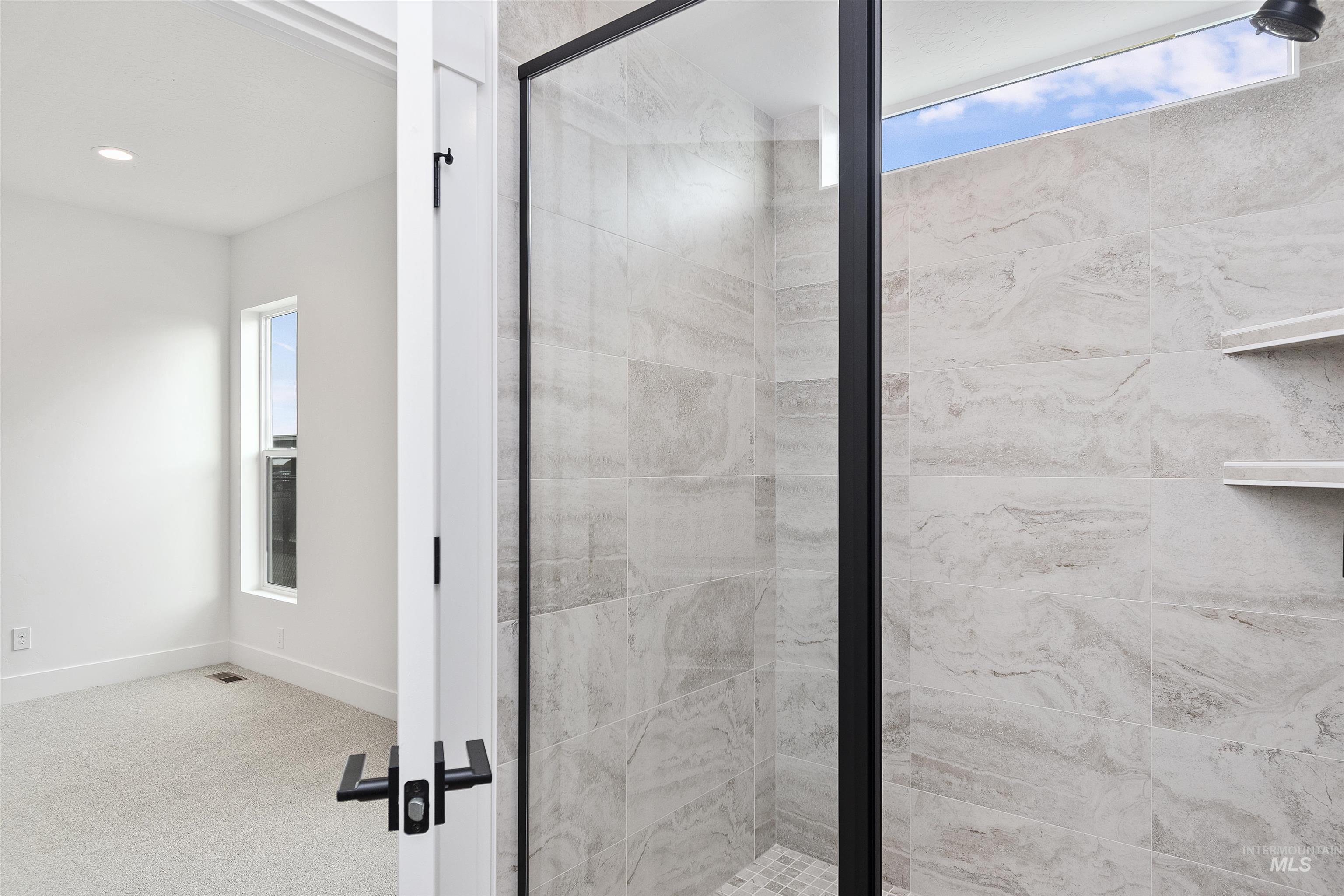 732 South Calhoun Lane Star, ID 83669 - Photo 22 of 48 Full bathroom with a shower stall and carpet