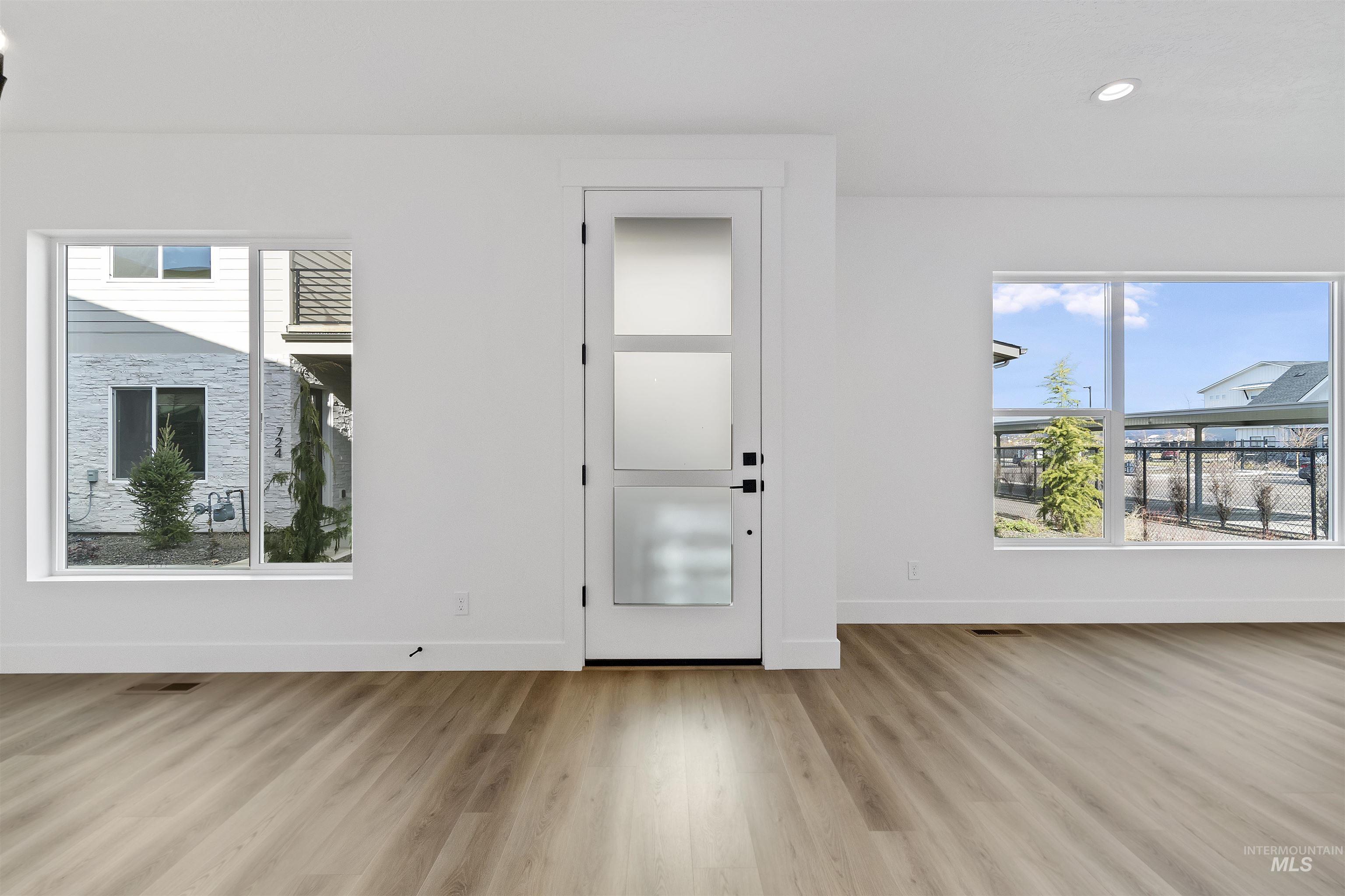 732 South Calhoun Lane Star, ID 83669 - Photo 3 of 48 Foyer entrance featuring plenty of natural light, light wood finished floors, and recessed lighting