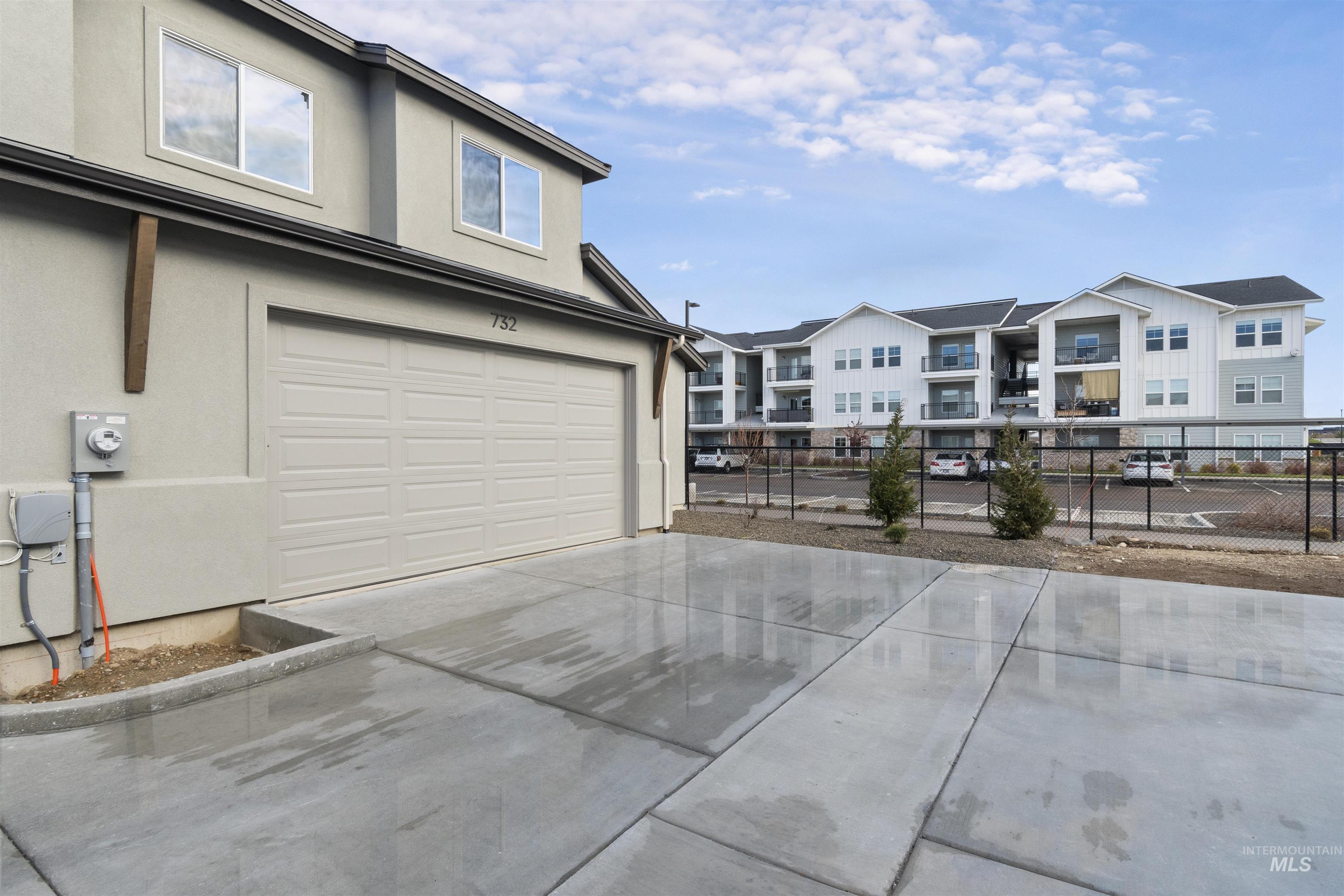 732 South Calhoun Lane Star, ID 83669 - Photo 4 of 50 Garage featuring driveway
