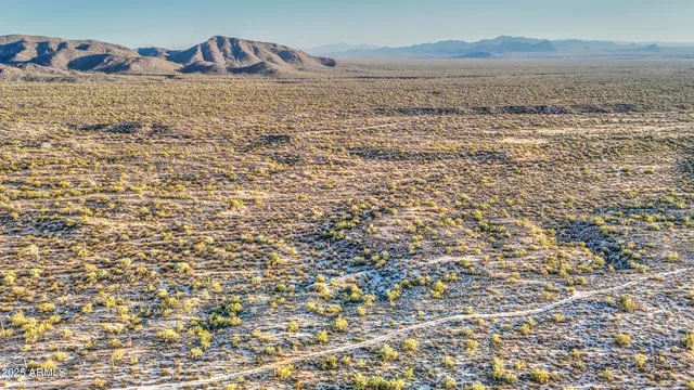 a view of ocean and mountain