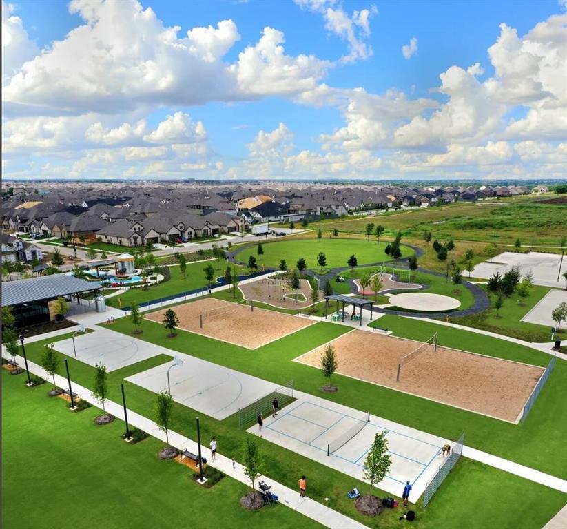 7636 Cherry Blossom Lane Little Elm, TX 76227 - Photo 23 of 31 a view of a city with lawn chairs