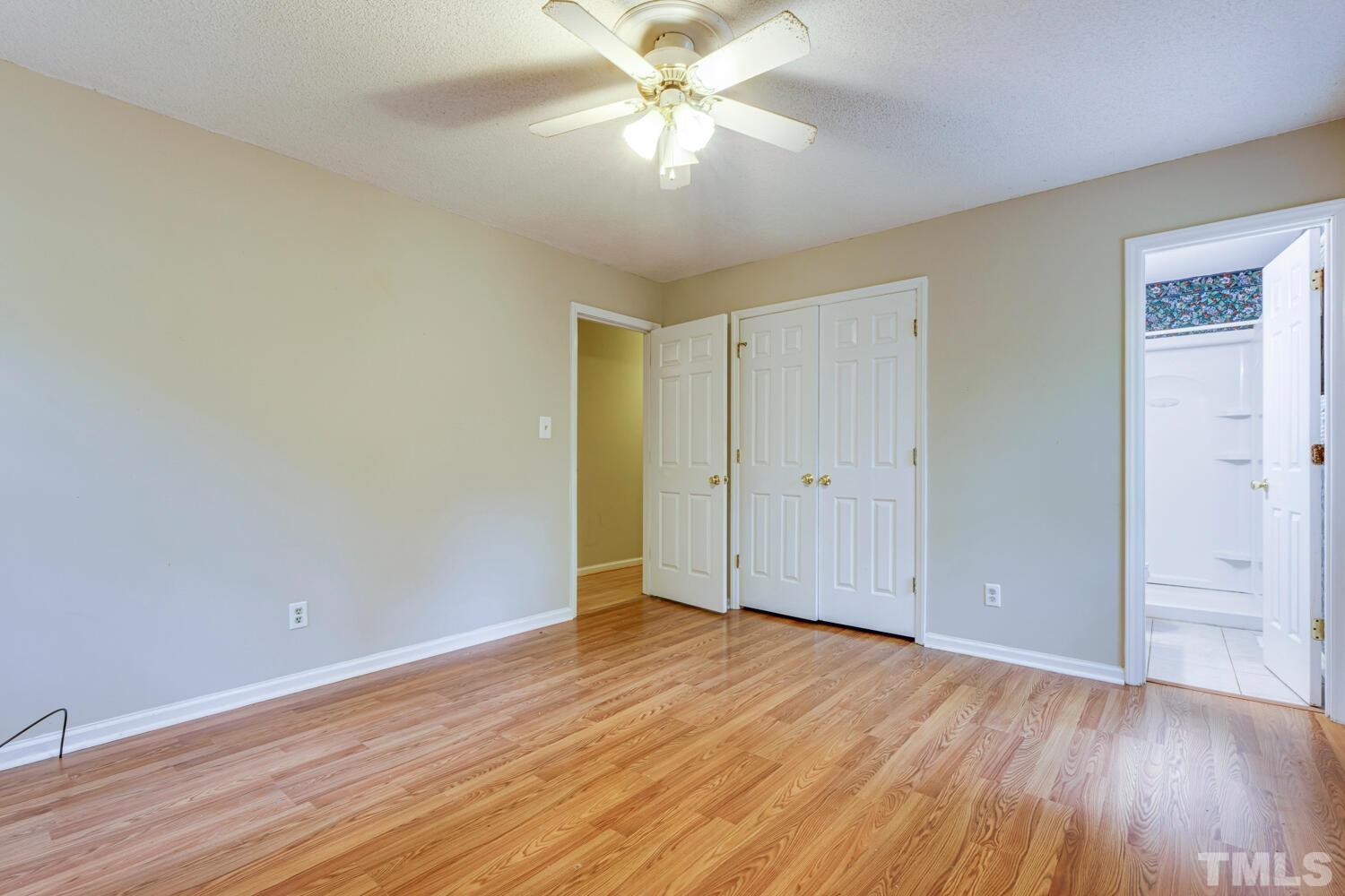 7305 Louisburg Road Raleigh, NC 27616 - Photo 15 of 24 With Double Closet and En Suite Bath