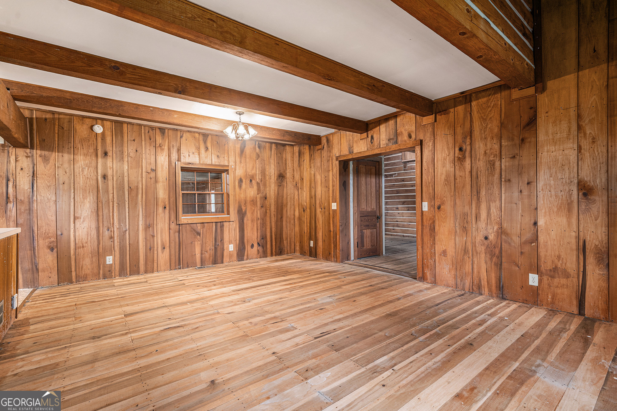 397 Highway 3 Street North Hampton, GA 30228 - Photo 11 of 32 a view of a room with wooden walls