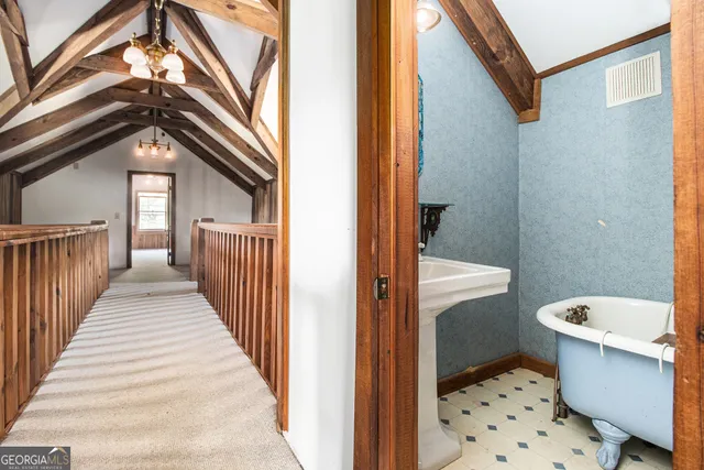 a view of a hallway to a house