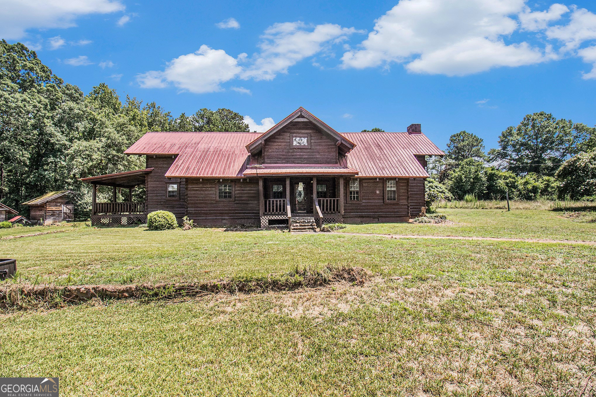 397 Highway 3 Street North Hampton, GA 30228 - Photo 22 of 32 a front view of a house with a yard