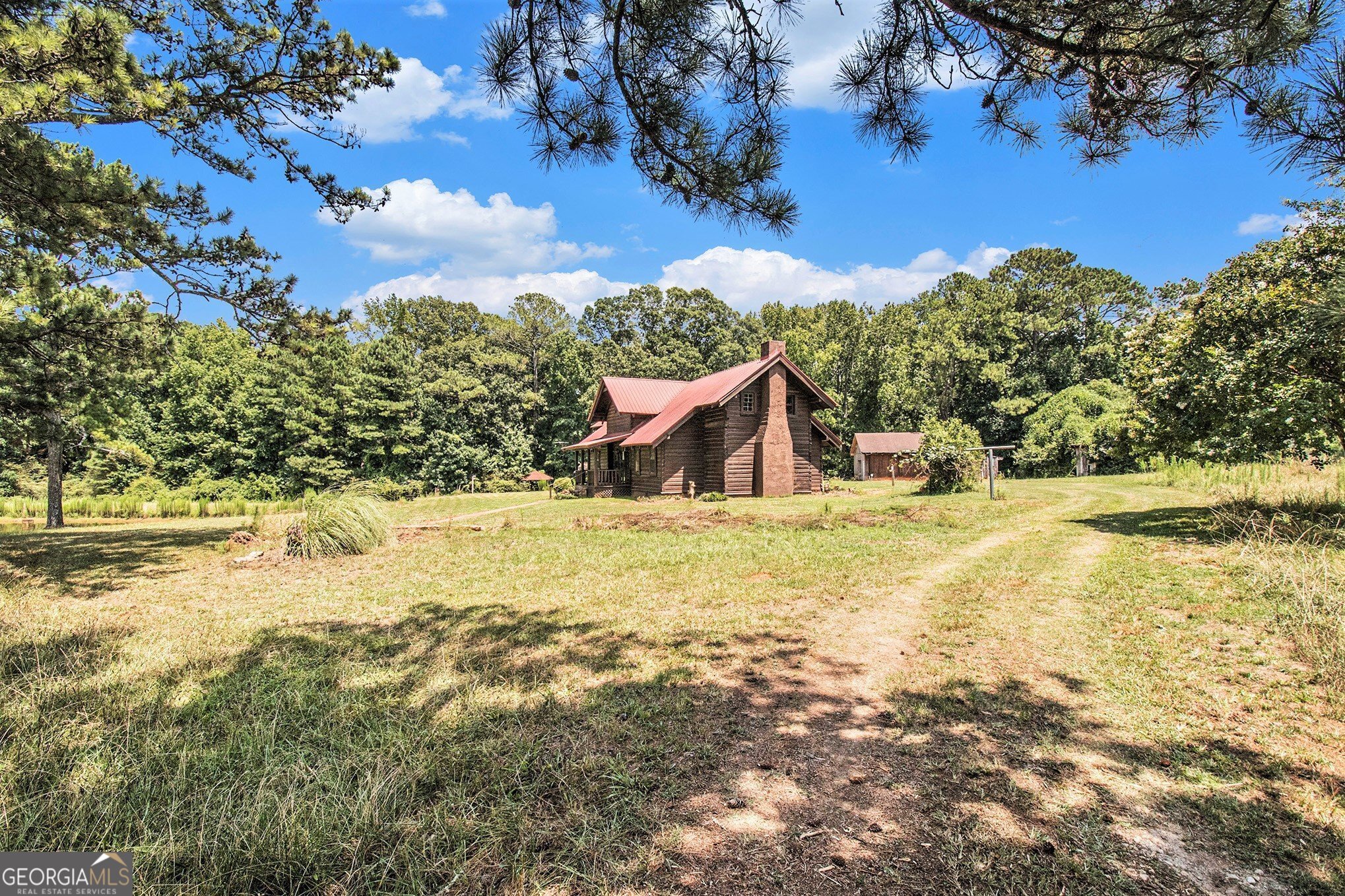 397 Highway 3 Street North Hampton, GA 30228 - Photo 24 of 32 a view of a yard with an outdoor space
