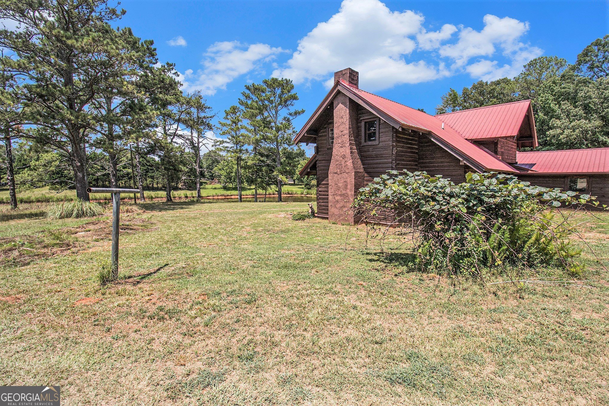 397 Highway 3 Street North Hampton, GA 30228 - Photo 26 of 32 a backyard of a house with lots of green space
