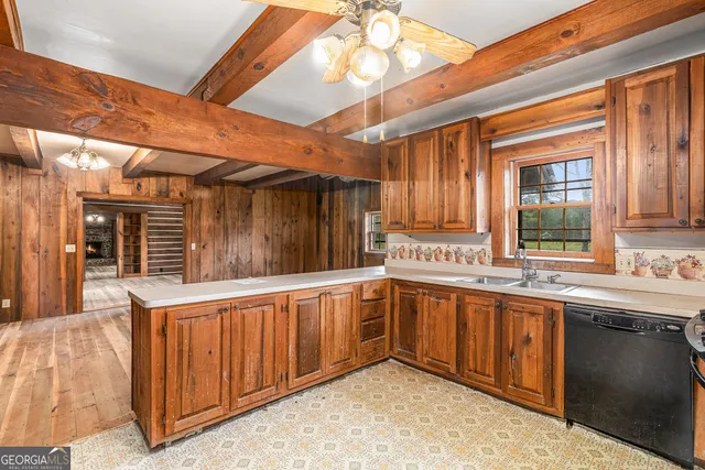 a kitchen with a sink and cabinets