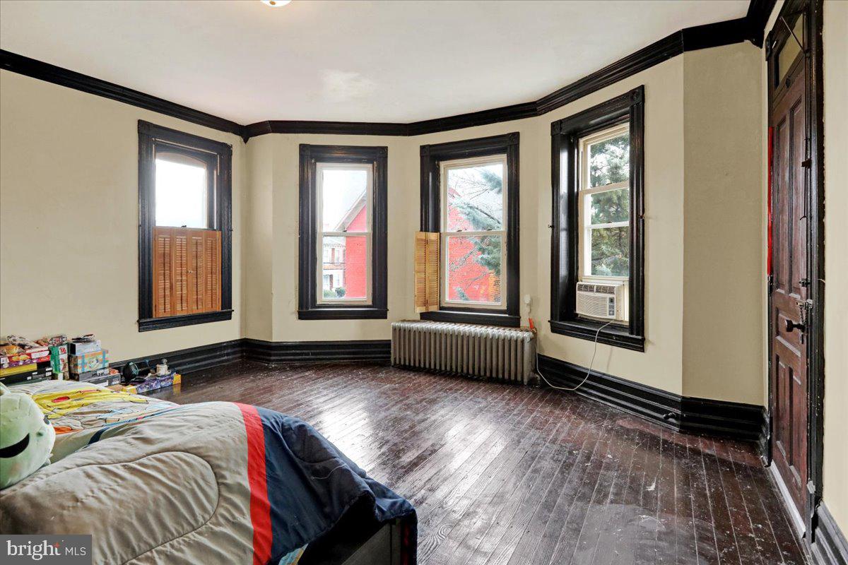 434 Main Street Oley, PA 19547 - Photo 15 of 30 a bedroom with a bed and a window