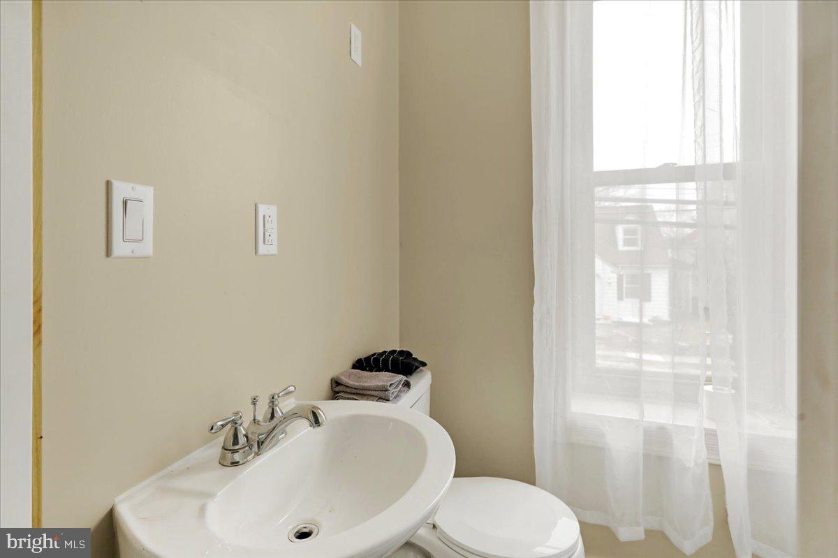 434 Main Street Oley, PA 19547 - Photo 23 of 30 a bathroom with a sink and a mirror