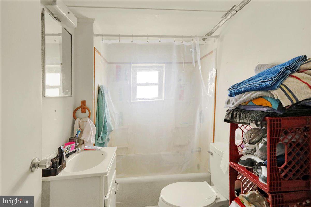 434 Main Street Oley, PA 19547 - Photo 28 of 30 a bathroom with a shower curtain and a sink