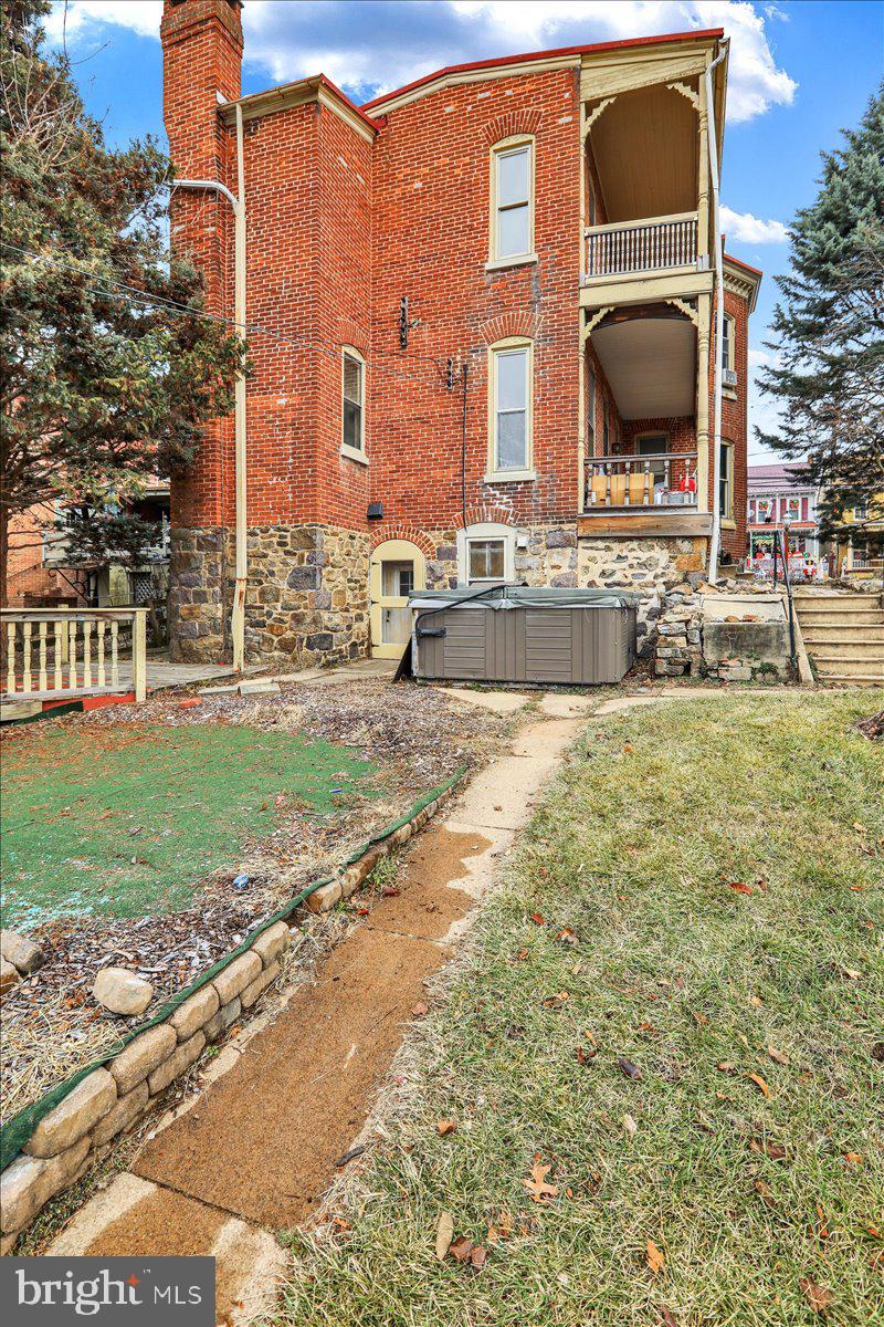 434 Main Street Oley, PA 19547 - Photo 5 of 30 a front view of a house with a yard