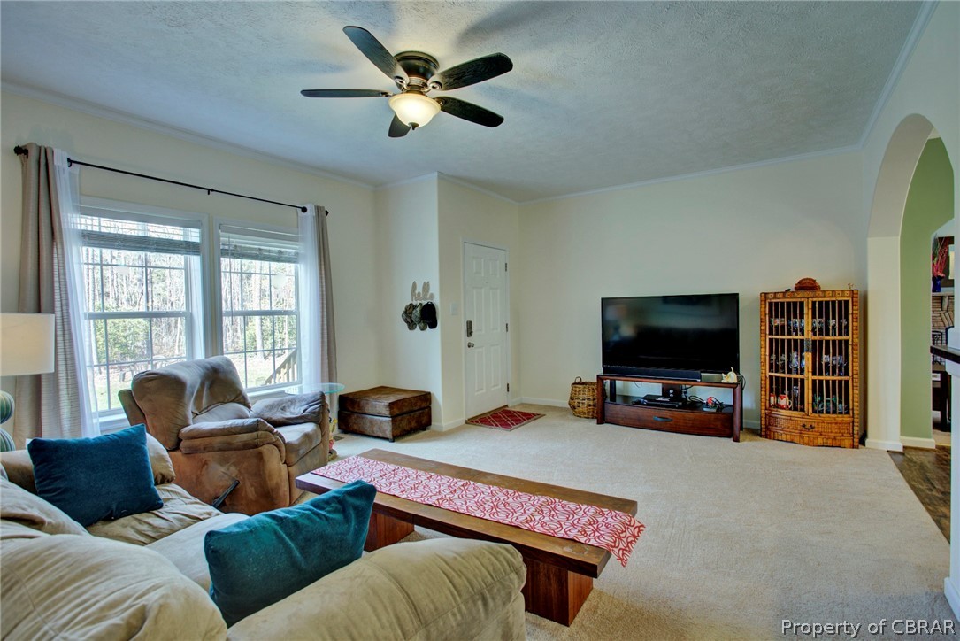 1496 Elsom Mascot Road Mattaponi, VA 23110 - Photo 4 of 33 a living room with furniture and a flat screen tv