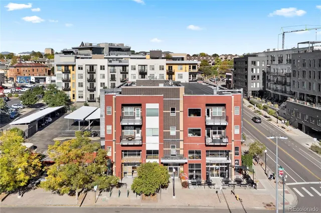 a view of a city with tall buildings