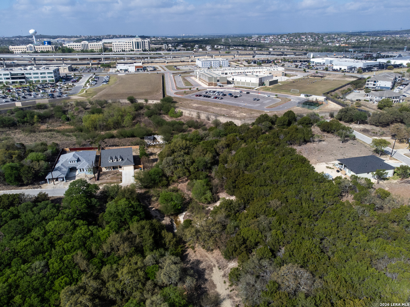 0 Utopia Selma, TX 78154 - Photo 16 of 23 an aerial view of a house with a yard