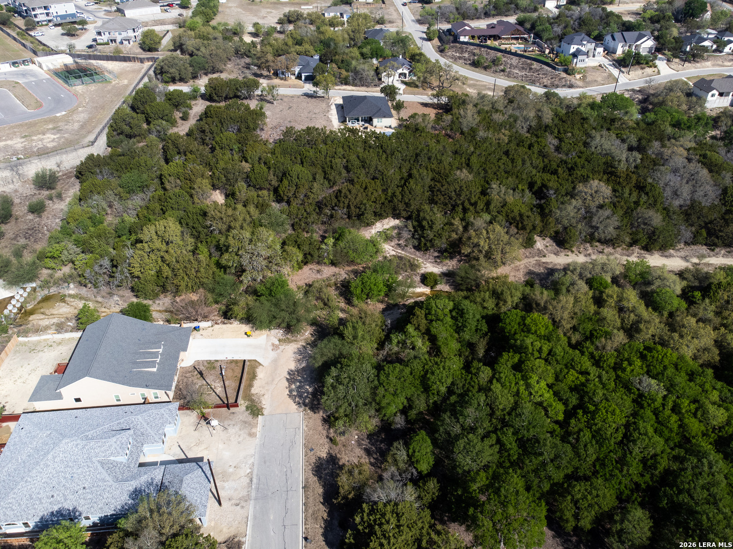 0 Utopia Selma, TX 78154 - Photo 19 of 23 an aerial view of residential house with outdoor space and trees all around
