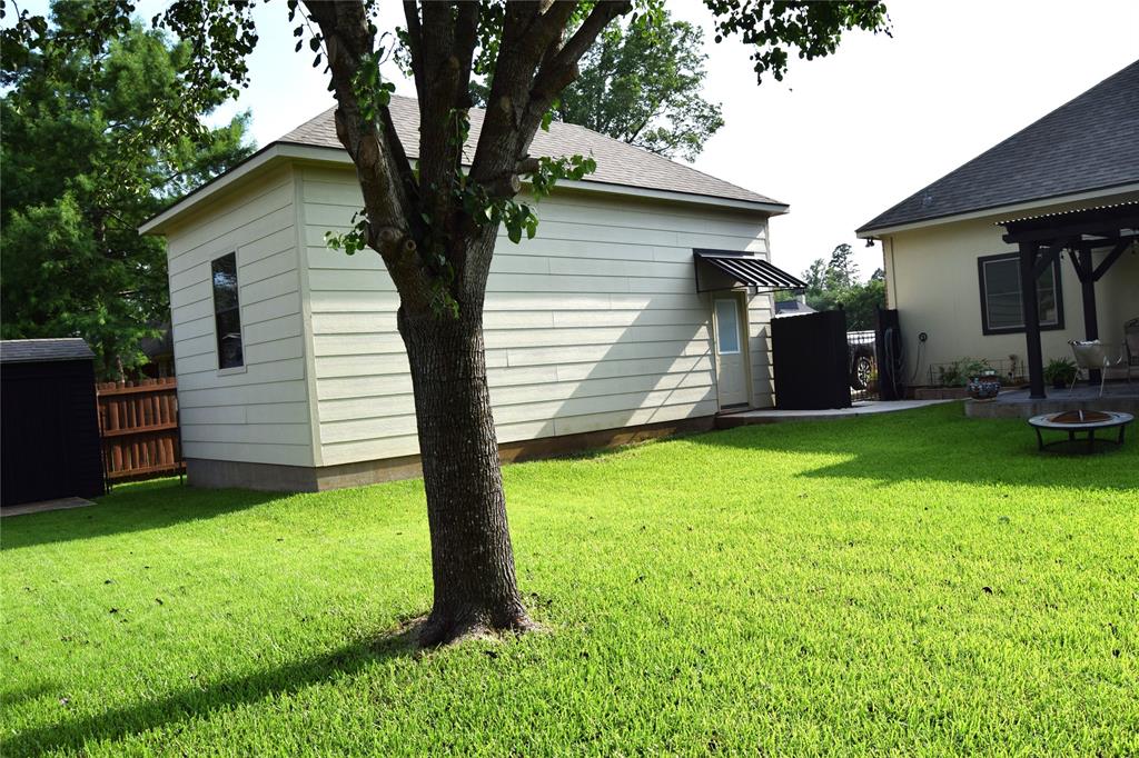 605 Jade Haughton, LA 71037 - Photo 29 of 34 15x30 shop on a slab has brick front to match house,hardy type board on sides and inside has cedar walls