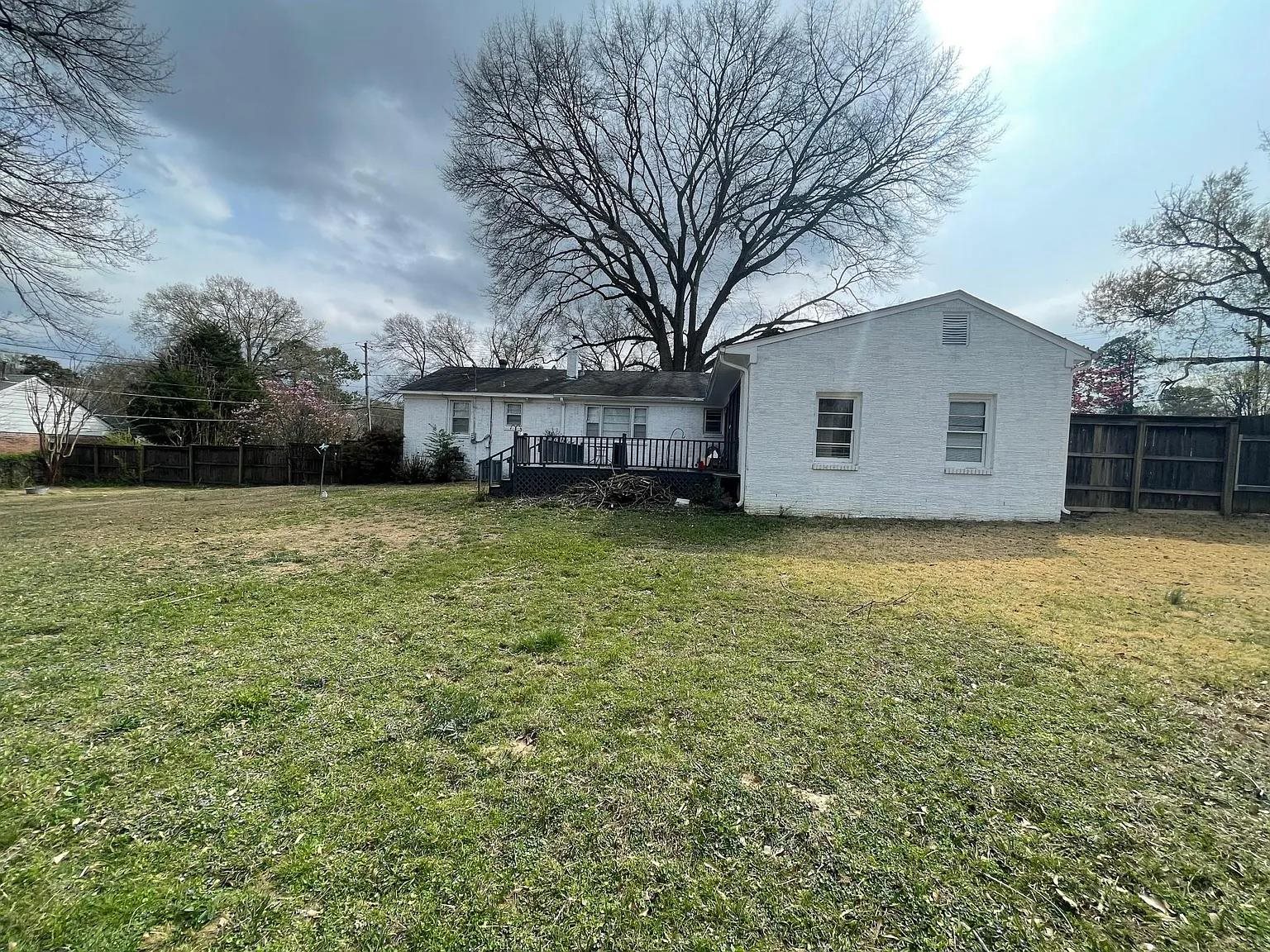 5568 Rich Road Memphis, TN 38120 - Photo 19 of 19 a view of a house with a yard
