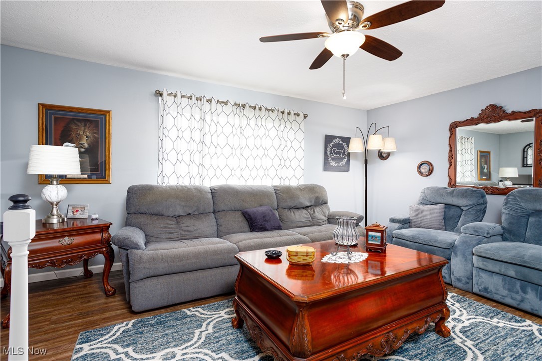 8972 Horn Road Windham, OH 44288 - Photo 10 of 25 Living room with hardwood / wood-style flooring and ceiling fan