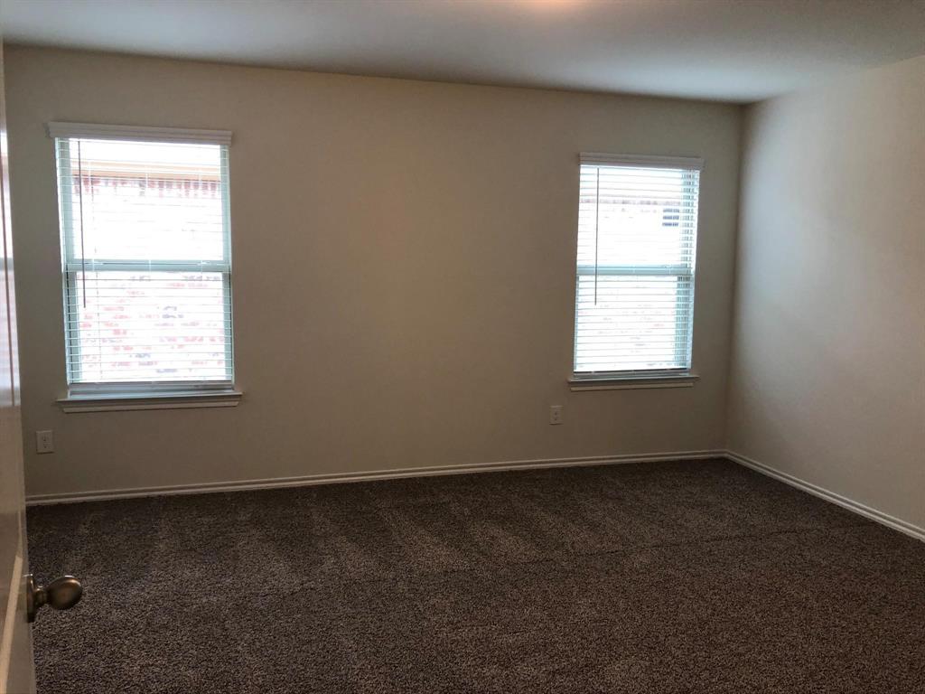 604 Rustic Meadows Trail Princeton, TX 75407 - Photo 4 of 15 an empty room with a window