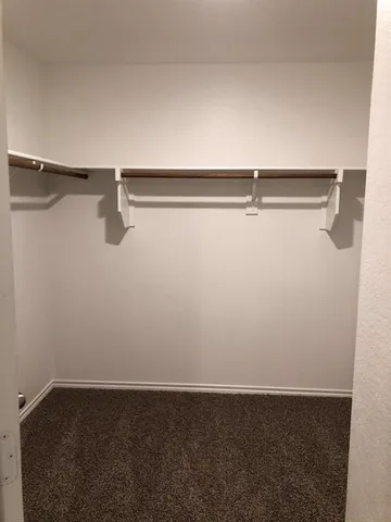 a view of small space with racks on the wall