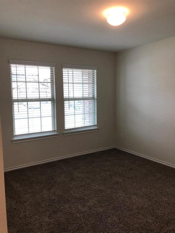 604 Rustic Meadows Trail Princeton, TX 75407 - Photo 9 of 15 an empty room with a window