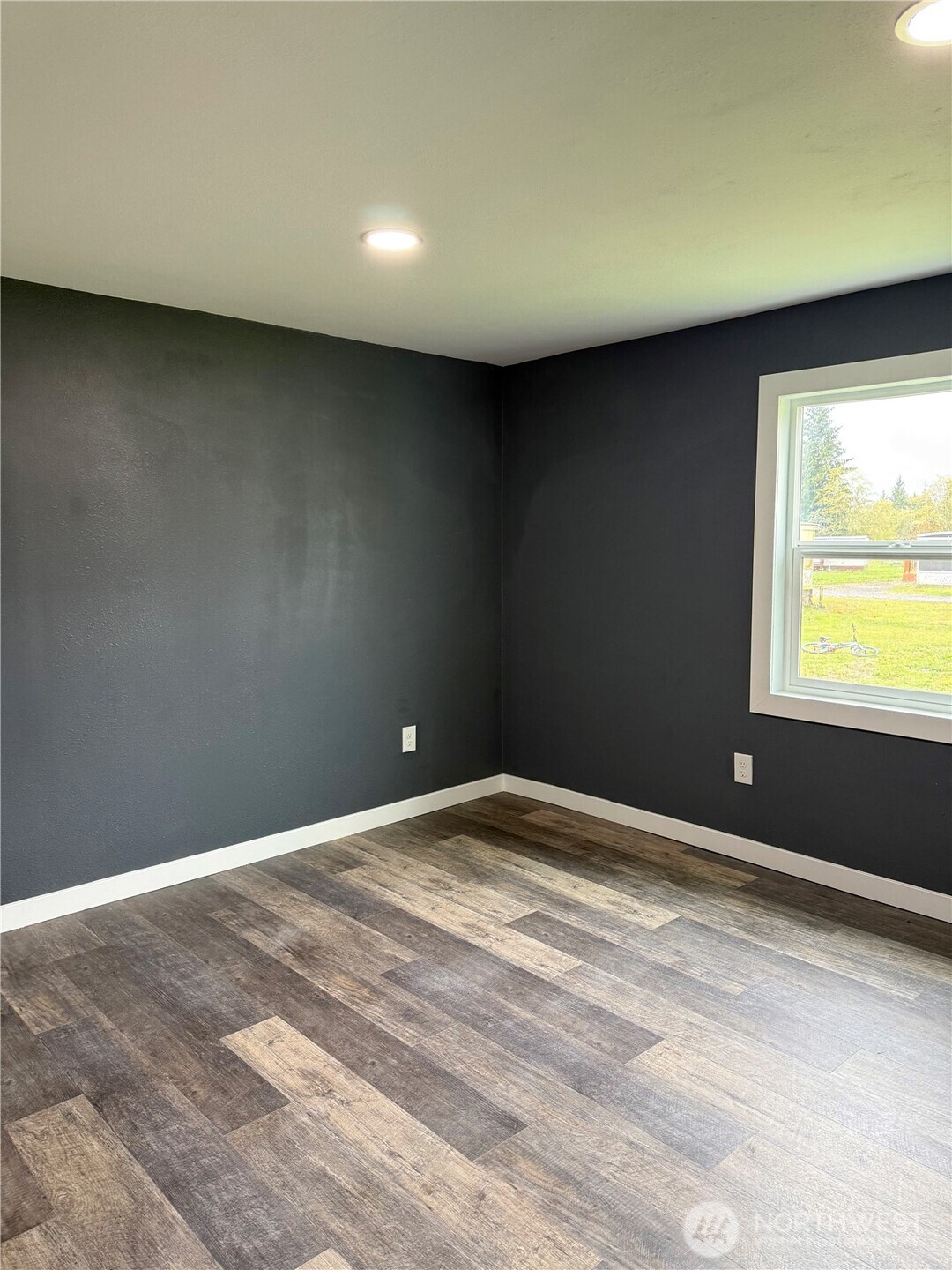 2610 Calawah Way, Unit 47 Forks, WA 98331 - Photo 3 of 17 a view of an empty room with a window