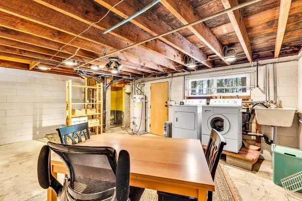 a view of a patio with table and chairs
