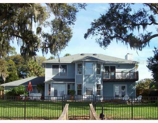 7306 Treasure Island Road Leesburg, FL 34788 - Photo 1 of 1 Exterior Back