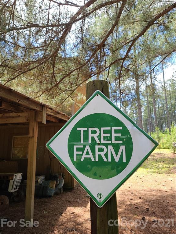 2680 Polk County Line Road Rutherfordton, NC 28139 - Photo 2 of 38 a sign on the side of a road