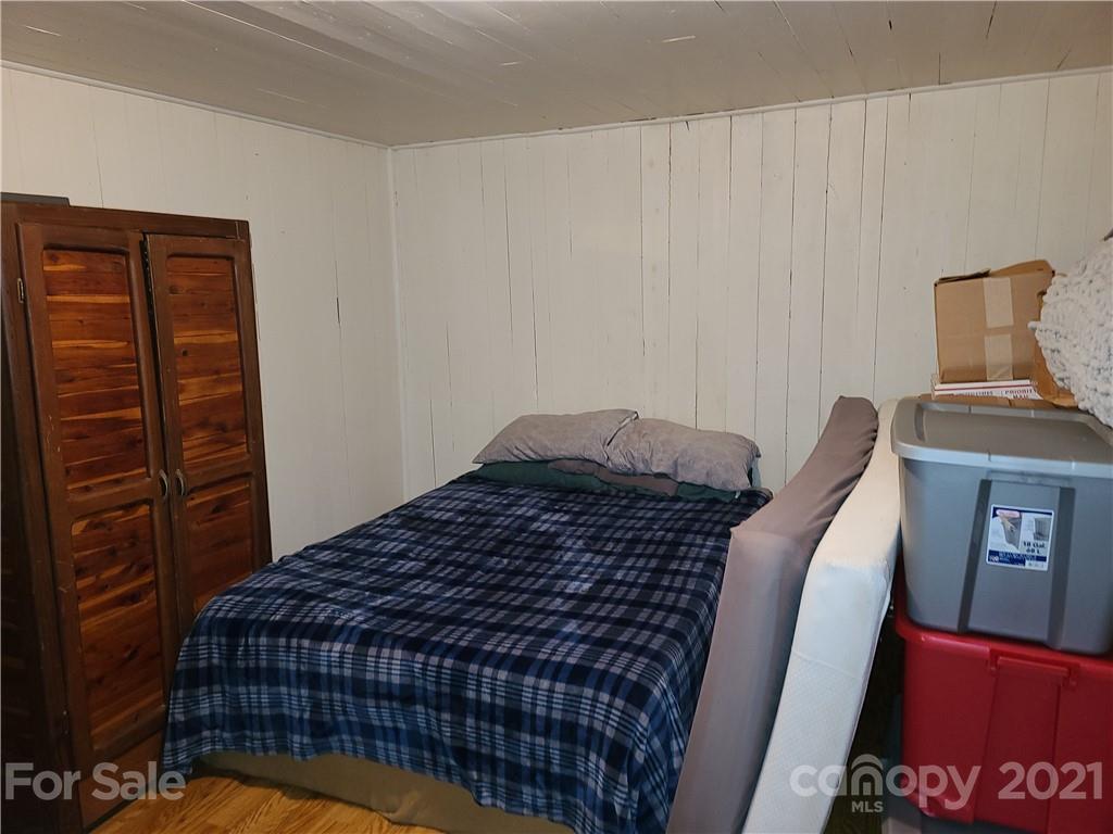2680 Polk County Line Road Rutherfordton, NC 28139 - Photo 18 of 38 a bedroom with a bed and dresser