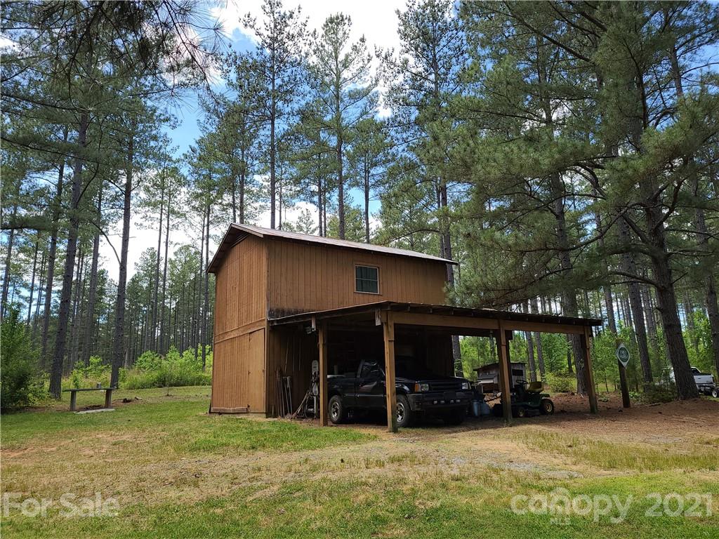 2680 Polk County Line Road Rutherfordton, NC 28139 - Photo 20 of 38 a view of a house with a yard