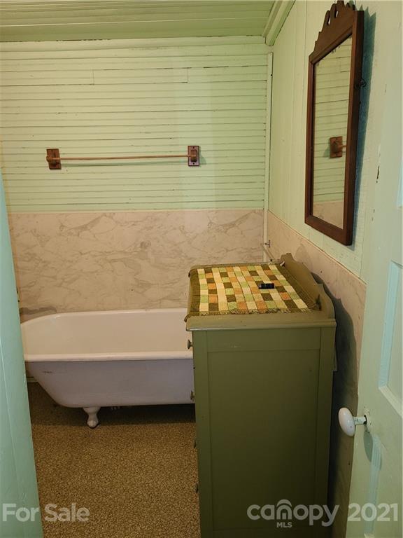 2680 Polk County Line Road Rutherfordton, NC 28139 - Photo 31 of 38 a bathroom with a bathtub