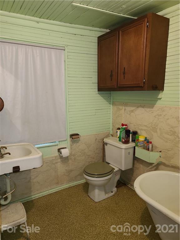 2680 Polk County Line Road Rutherfordton, NC 28139 - Photo 32 of 38 a bathroom with a sink and a toilet