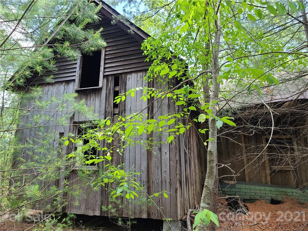 2680 Polk County Line Road Rutherfordton, NC 28139 - Photo 36 of 38 a backyard of a house with lots of green space