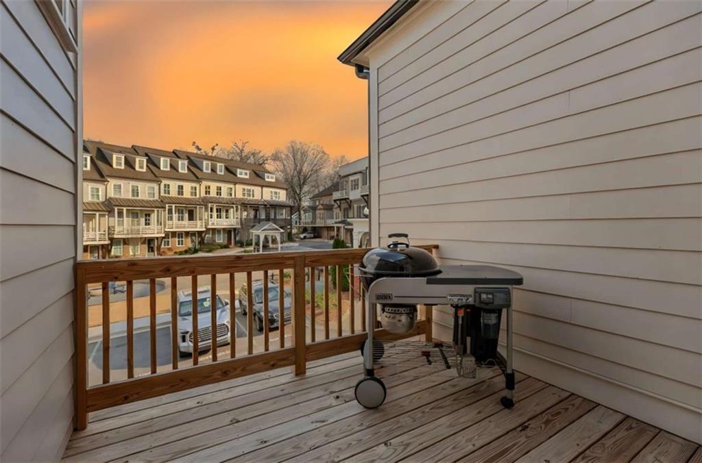 4466 Lemon Street Acworth, GA 30101 - Photo 52 of 65 a view of balcony with wooden floor and seating space