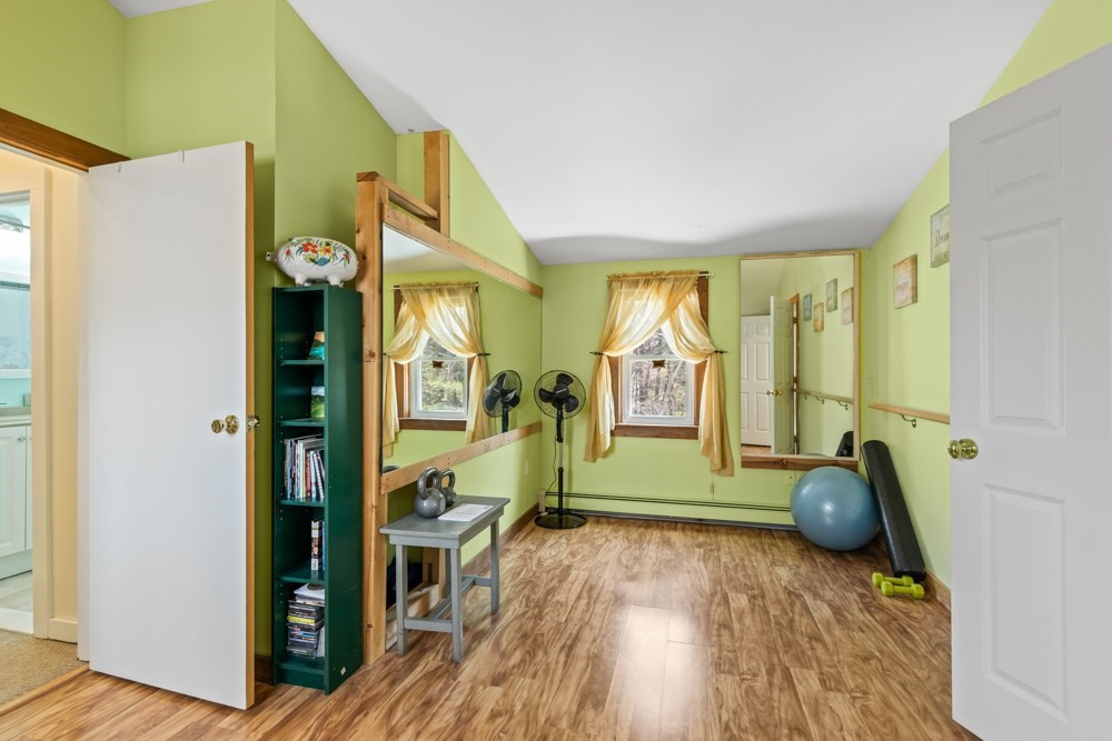 8 Trotters Lane Barnstable, MA 02648 - Photo 21 of 41 a bedroom with furniture and a large window