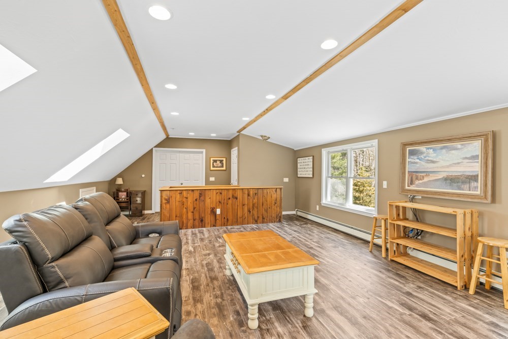 8 Trotters Lane Barnstable, MA 02648 - Photo 25 of 41 a living room with furniture and a flat screen tv
