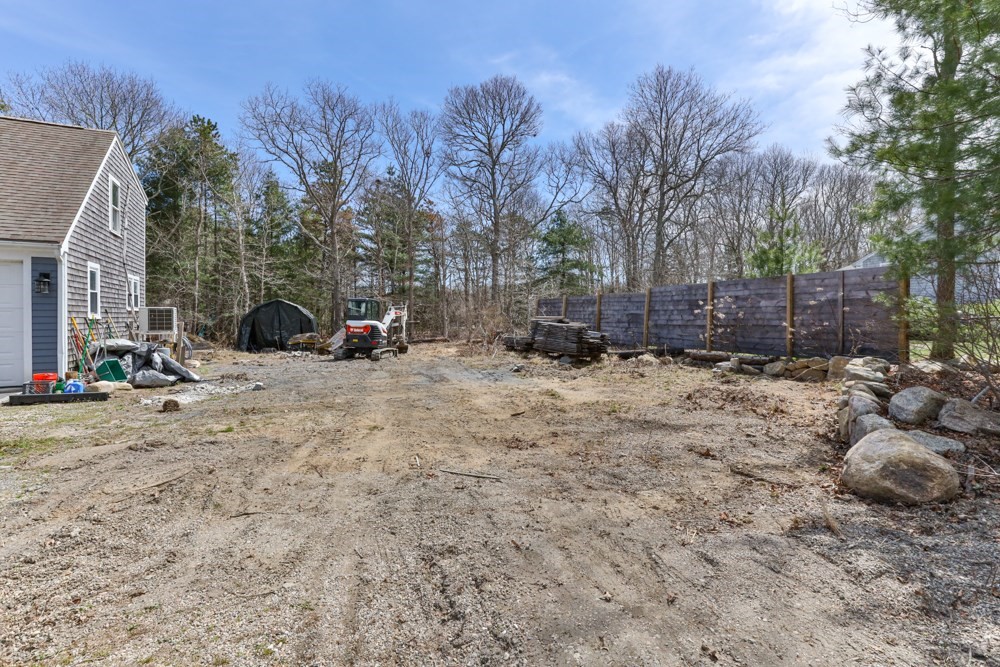 8 Trotters Lane Barnstable, MA 02648 - Photo 31 of 41 a view of a yard with a tree