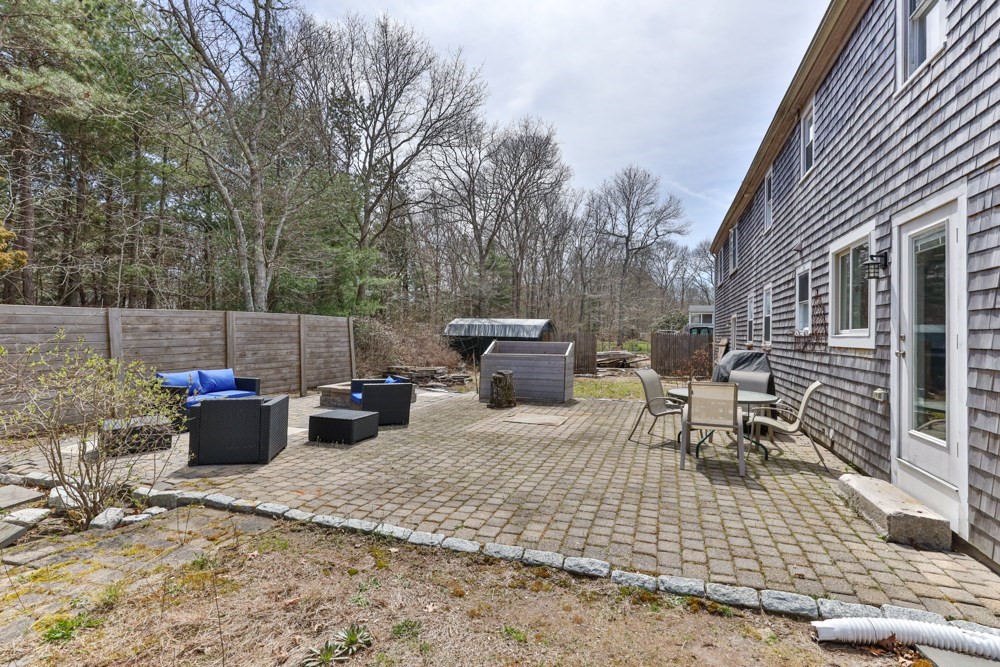 8 Trotters Lane Barnstable, MA 02648 - Photo 35 of 41 a view of a patio with couches and chairs